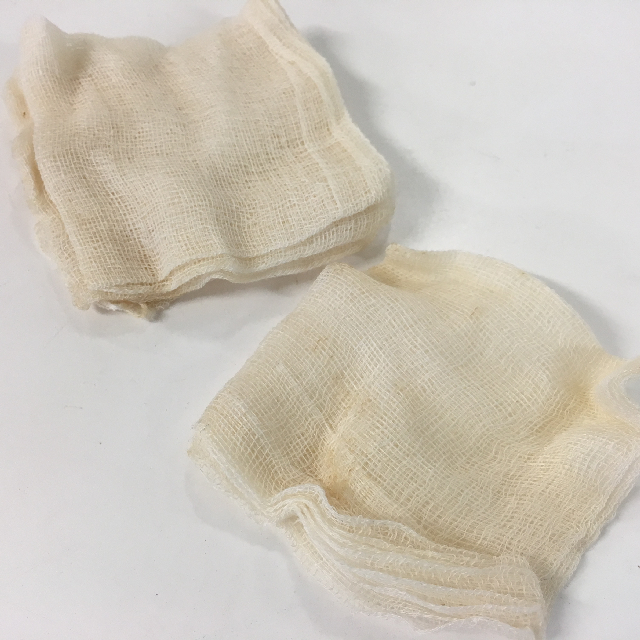 DRESSING, Gauze - Aged